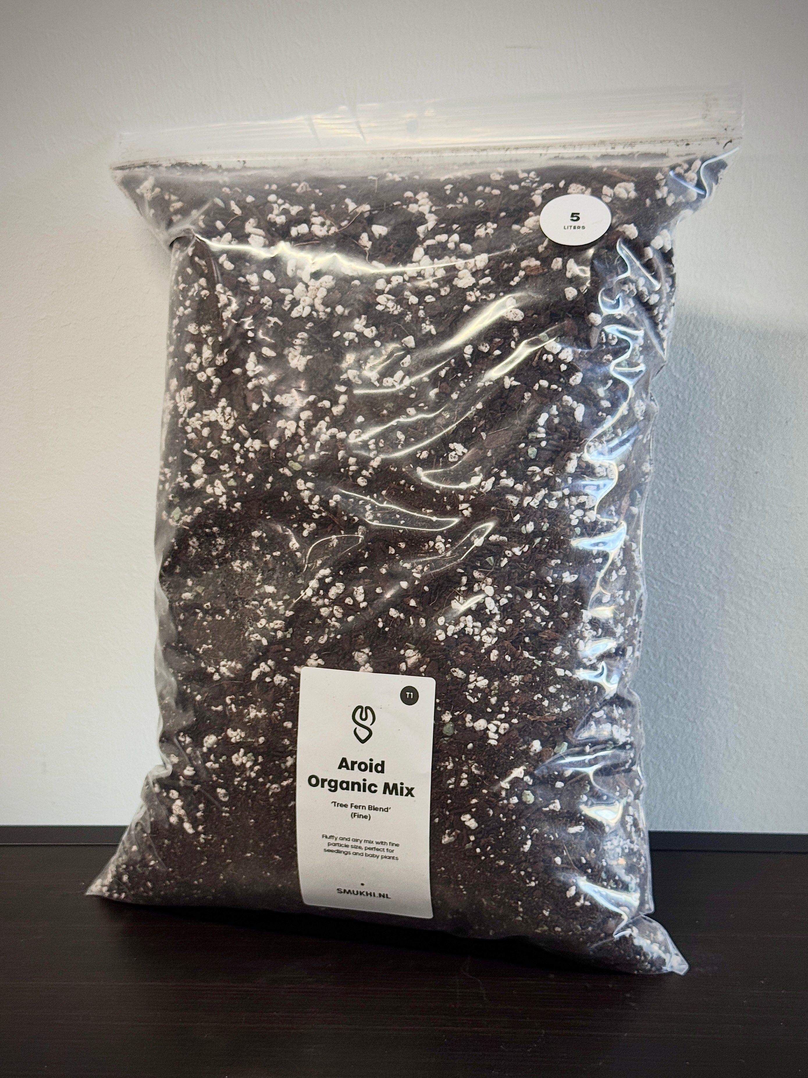 Aroid Organic Mix substrate by SMUKHI, showing a close-up of the nutrient-rich, organic soil blend suitable for indoor plants.