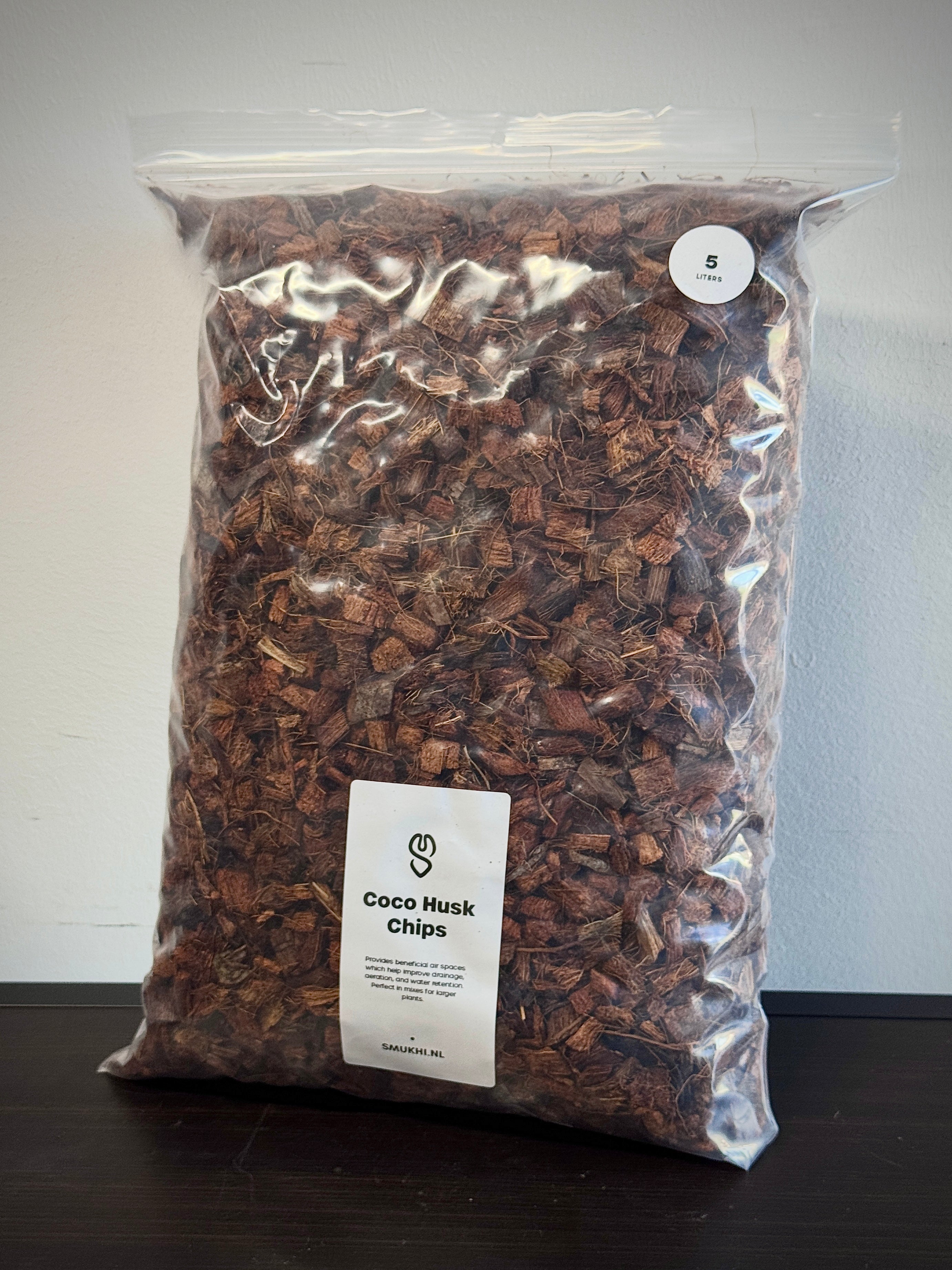 ReptiBlock Coco Husk Chips substrate for reptiles, natural coconut fiber bedding, shown in a clean, textured pile.