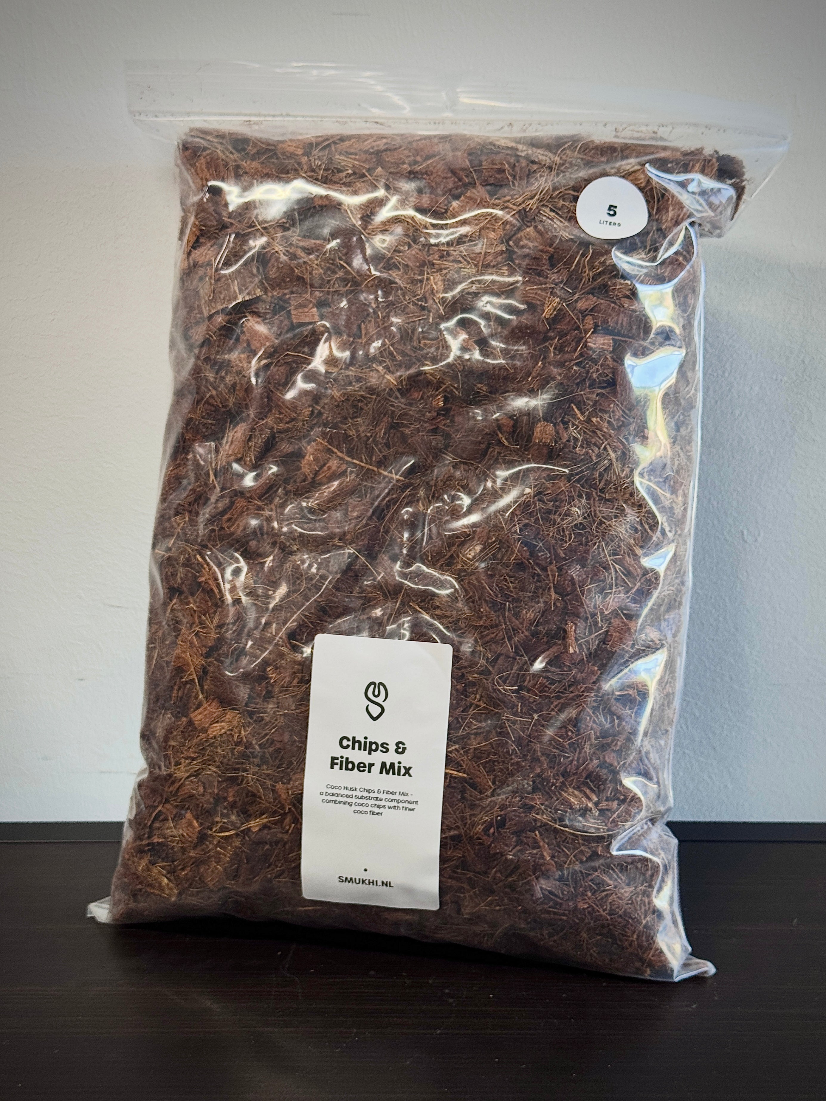 SMUKHI Coco Husk Chips and Fiber Mix substrate with textured coconut husk pieces and fiber for plant growth and soil health.